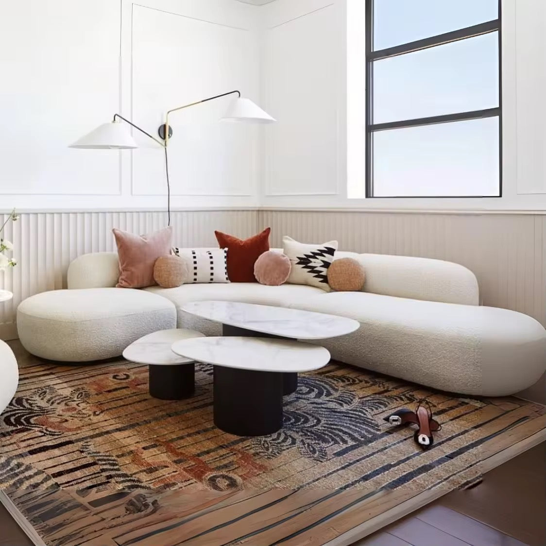 Orivo Curved Couch side view - boucle fabric sofa - The Flamingo Life