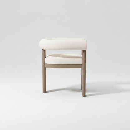 Dining chair with wooden frame and white cushion on a white background