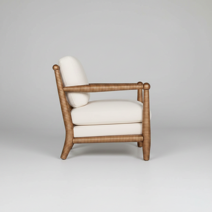 Lounge chair with dimensions on a peach background