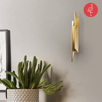 Casper Wall Mounted Light angle view - gold-accented furniture - The Flamingo Life
